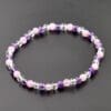 Gouden driehoek armband met 4mm kralen van amethist, bergkristal en rozenkwarts