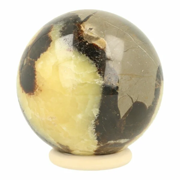 Heldere septarie bol met een diameter van 7cm op houten ring