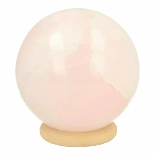 Fijne lichtroze mangano calciet bol met diameter van 69mm op houten ring