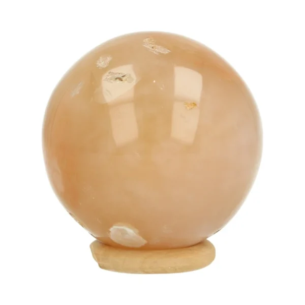 Mooie zachte bloemagaat bol met diameter van 52mm op houten ring