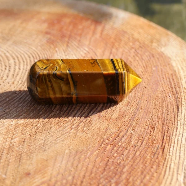 Fraaie goud-glanzende tijgeroog massagesteen van 5cm lang